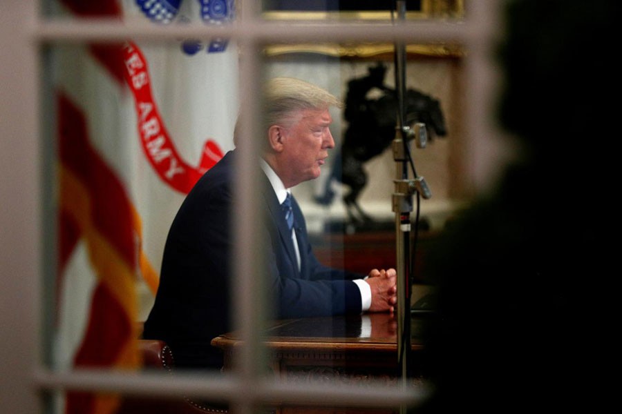 US President Donald Trump addresses the nation during a live television broadcast regarding the COVID-19 coronavirus pandemic, from inside the Oval Office at the White House in Washington, U.S., March 11, 2020: All global investors got from US President Donald Trump's coronavirus package were a shock travel ban on Europe and a flashing signal to sell, and none of the large-scale tax breaks or medical tests for Americans they'd been expecting. The deep disappointment with Trump's much-touted plan, which he unveiled late on Wednesday, spurred massive falls in global stock markets. US stock index futures ESc1 plunged nearly 5.0 per cent, almost hitting their circuit breakers for the second time in a week —Reuters