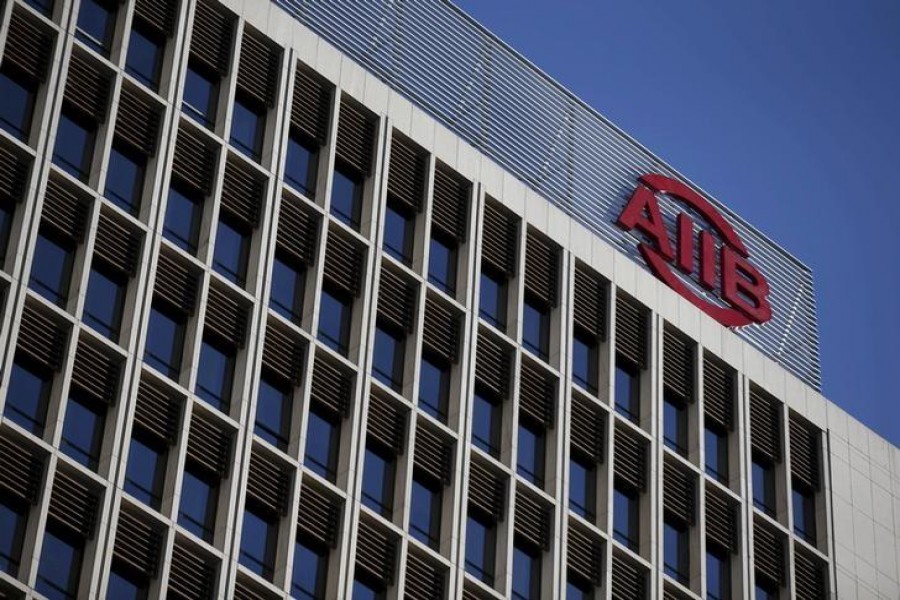 The logo of Asian Infrastructure Investment Bank (AIIB) is seen at its headquarter building in Beijing January 17, 2016.REUTERS/Kim Kyung-Hoon