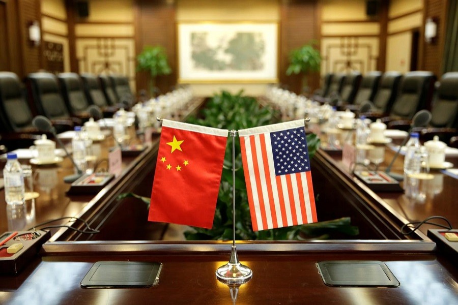 Flags of US and China are placed for a meeting between Secretary of Agriculture Sonny Perdue and China's Minister of Agriculture Han Changfu at the Ministry of Agriculture in Beijing, China, June 30, 2017. — Reuters/Files