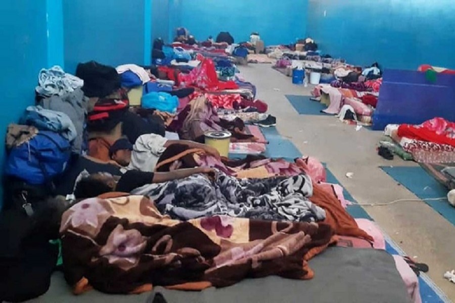 Representational image: Migrants resting on the floor of a detention centre, amidst concerns over the spread of the coronavirus disease (COVID-19), in the city of Zawiya, Libya May 05, 2020. — Reuters/Files