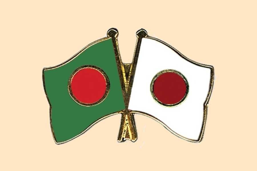 Flags of Bangladesh and Japan are seen cross-pinned in this photo symbolising friendship between the two nations