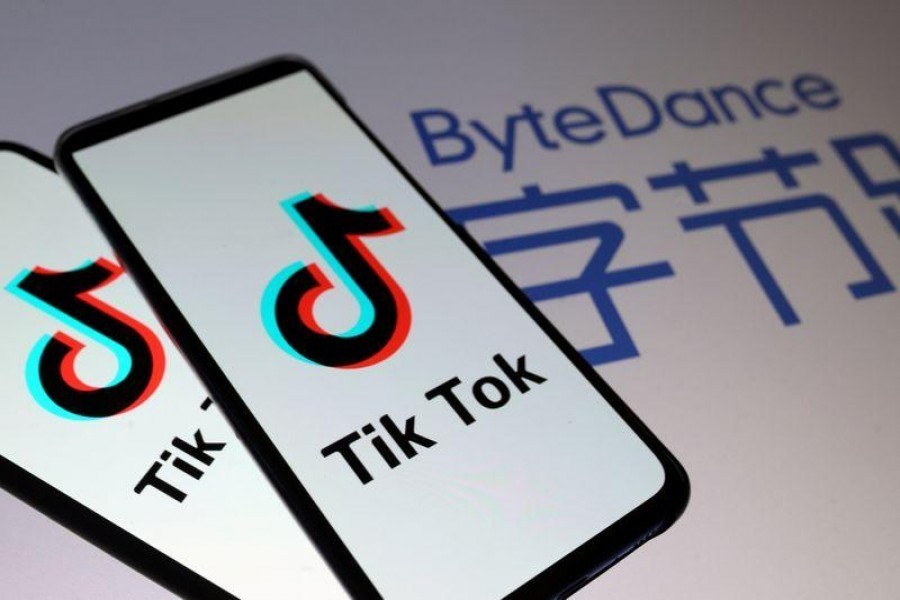 TikTok logos are seen on smartphones in front of a displayed ByteDance logo in this illustration taken on November 27, 2019 — Reuters/Files
