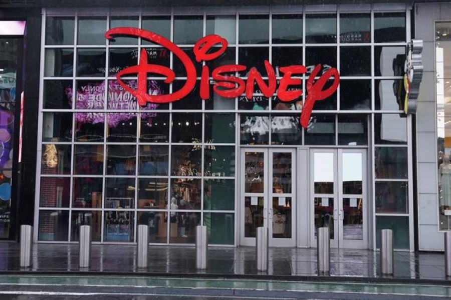 A closed Disney store is pictured in Times Square following the outbreak of coronavirus disease (COVID-19), in the Manhattan borough of New York City, New York, US, March 23, 2020. REUTERS/Carlo Allegri