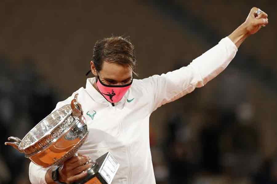 Rafael Nadal celebrating with the trophy after winning the French Open final against Serbia’s Novak Djokovic on Sunday –Reuters Photo