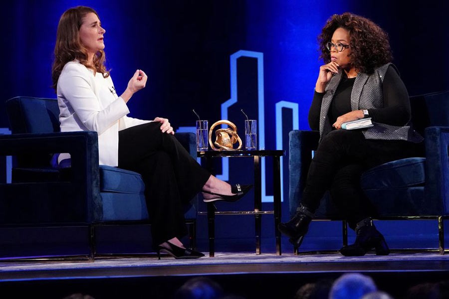 Melinda Gates (L) speaking to Oprah Winfrey on stage during a taping of her TV show in New York in 2019 -Reuters file photo