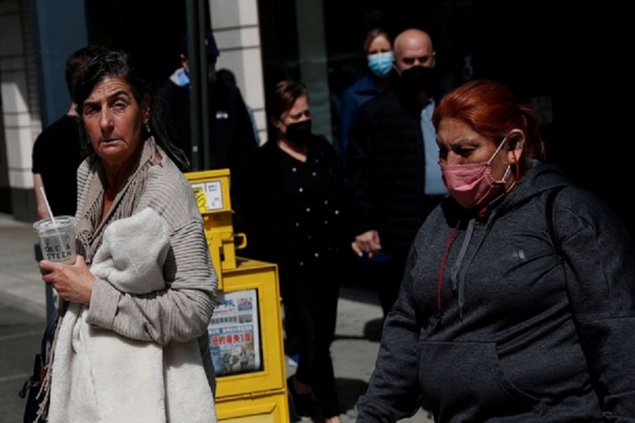 A woman walks without a protective face mask, after the Centers for Disease Control and Prevention (CDC) announced new guidelines regarding outdoor mask wearing and vaccinations during the outbreak of the coronavirus disease (COVID-19) in Manhattan, New York City, US, April 27, 2021. Reuters A man wearing a protective mask stands outside Louis Vuitton luxury store at the Americana Manhasset open-air shopping complex in Manhasset, New York, US, May 3, 2021. Reuters A man wearing a protective mask stands outside Louis Vuitton luxury store at the Americana Manhasset open-air shopping complex in Manhasset, New York, US, May 3, 2021. Reuters PreviousNext
