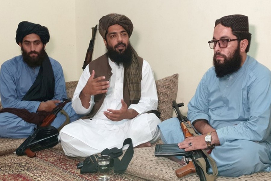 Waheedullah Hashimi (C), a senior Taliban commander, gestures as he speaks with Reuters during an interview at an undisclosed location near Afghanistan-Pakistan border August 17, 2021 — Reuters/Stringer