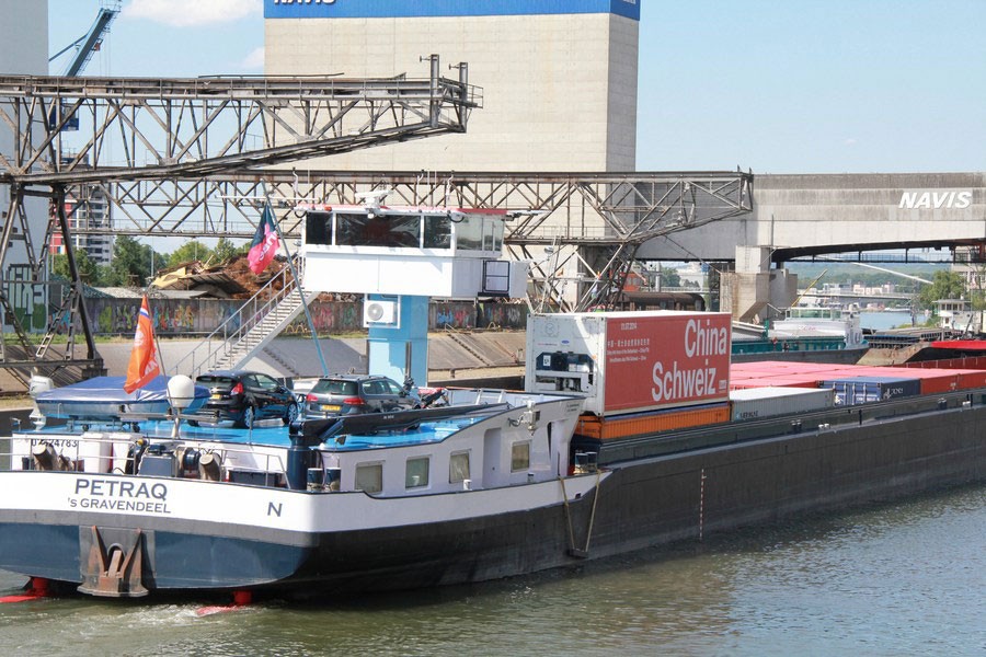 The first tariff-free goods are seen after being landed in the Rhine port in Basel, Switzerland, July 1, 2014. —Xinhua photo