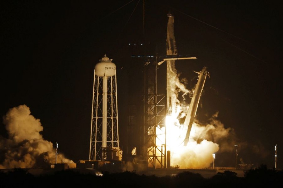 A SpaceX Falcon 9 rocket, with the Crew Dragon capsule, is launched carrying three NASA and one ESA astronauts on a mission to the International Space Station at the Kennedy Space Center in Cape Canaveral, Florida, U.S. November 10, 2021. REUTERS/Joe Skipper