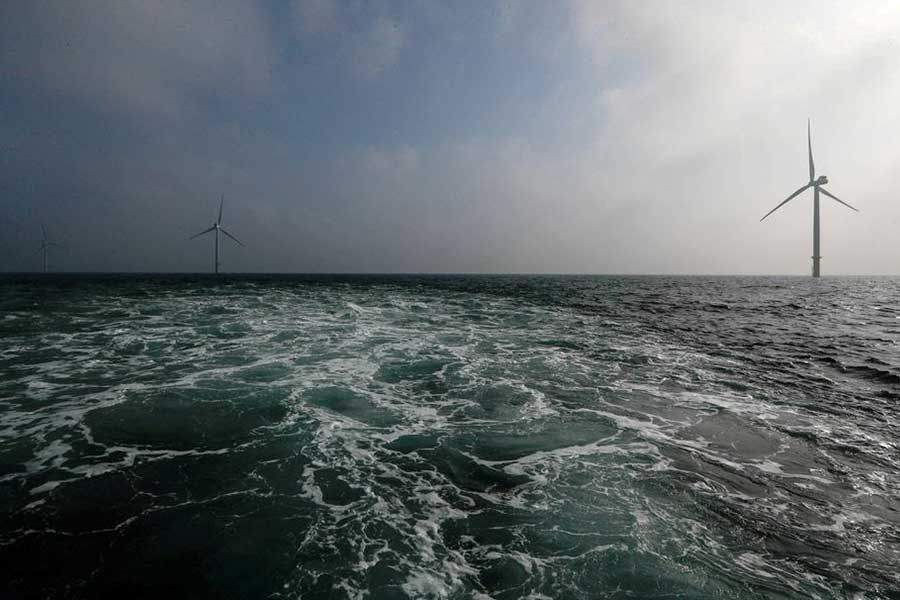 Power-generating windmill turbines at the Eneco Luchterduinen offshore wind farm near Amsterdam of Netherlands -Reuters file photo