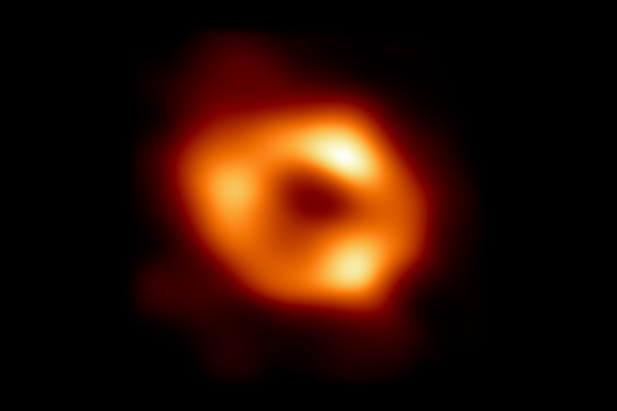This is the first image of Sgr A*, the supermassive black hole at the centre of our galaxy. It’s the first direct visual evidence of the presence of this black hole. It was captured by the Event Horizon Telescope (EHT), an array which linked together eight existing radio observatories across the planet to form a single “Earth-sized” virtual telescope. The telescope is named after the event horizon, the boundary of the black hole beyond which no light can escape. Credit: EHT Collaboration