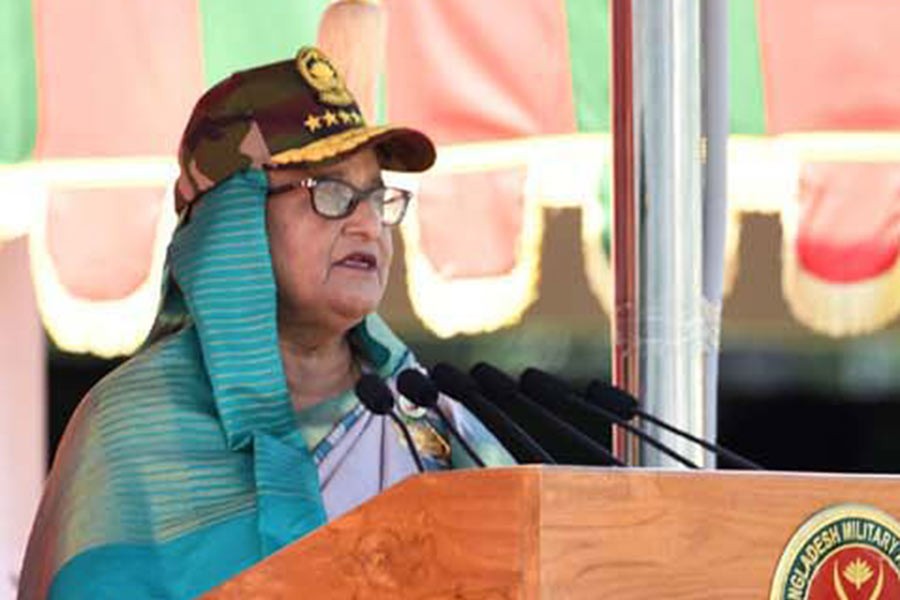 Prime Minister Sheikh Hasina addressing a ceremony marking the President Parade-2022 of the passing out cadets of the 83rd BMA Long Course at the parade ground of Bangladesh Military Academy (BMA) in Bhatiary of Chattogram on Sunday –PID Photo