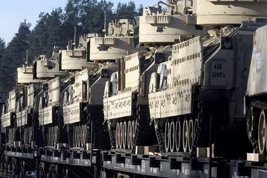 US Bradley Fighting Vehicles that will be deployed in Latvia for NATO's Operation Atlantic Resolve wait for an unload in Garkalne, Latvia Feb 8, 2017. REUTERS